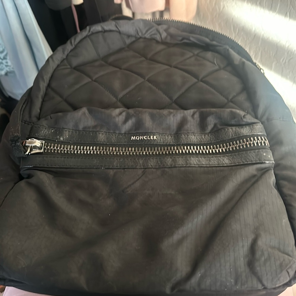 Black beautiful quilted Monclar backpack with zipper front pocket